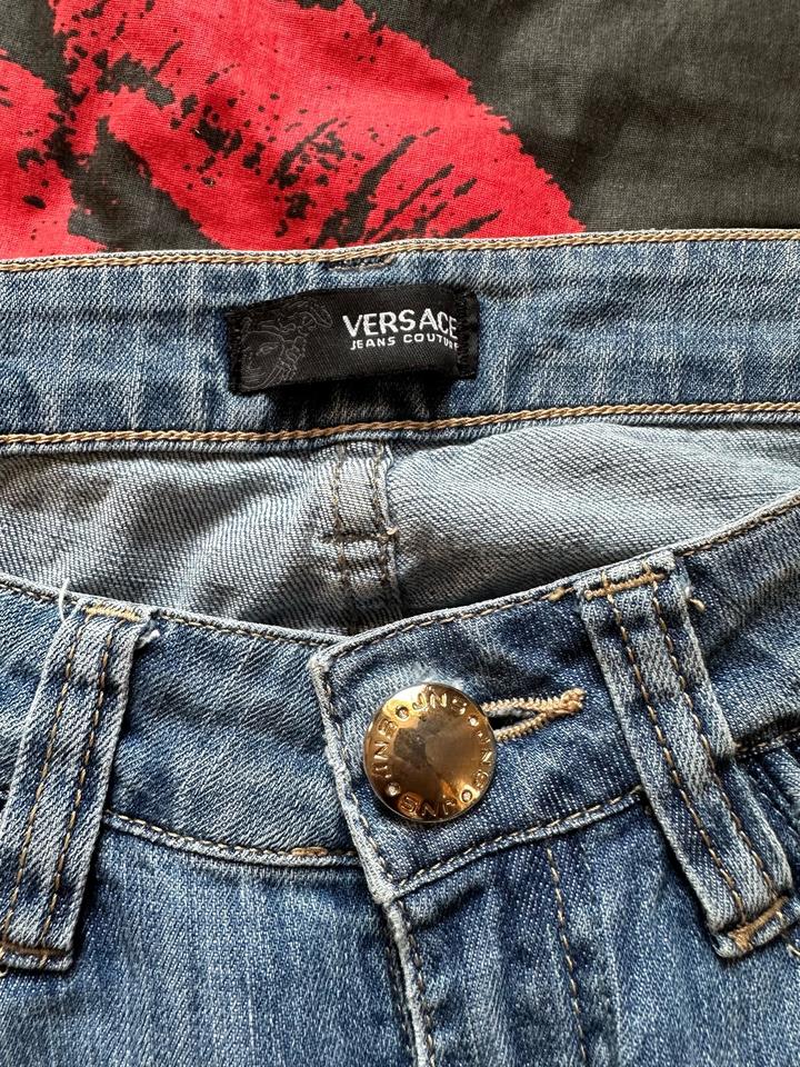 Джинсы Versace