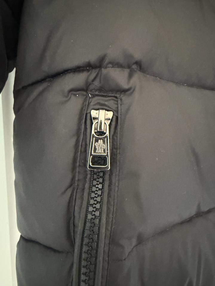 Зимний пуховый комбинезон moncler