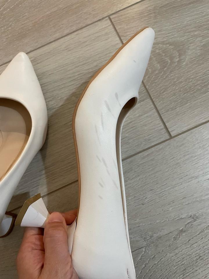 Белые свадебные туфли