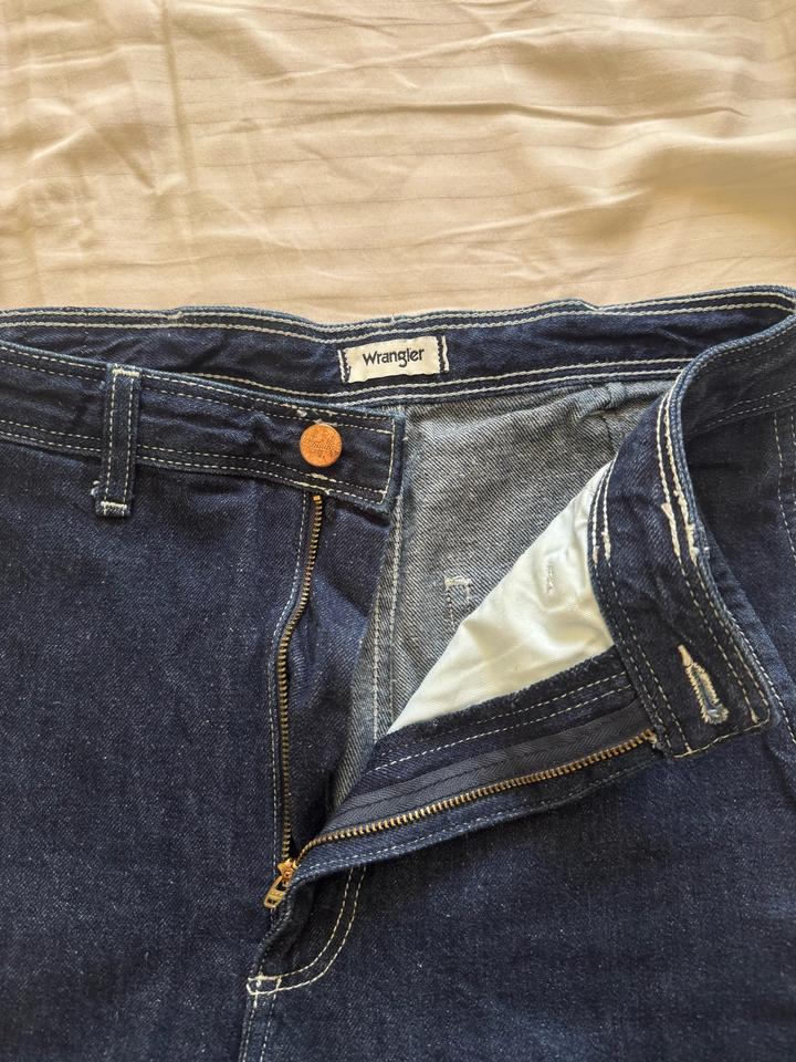 джинсы Wrangler