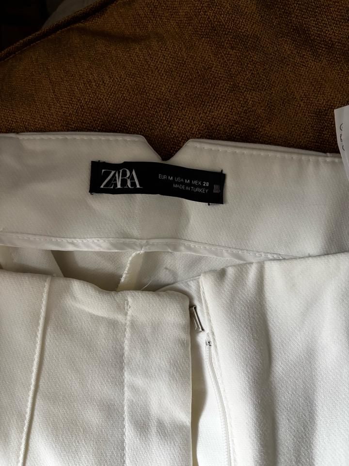 Белые брюки от Zara