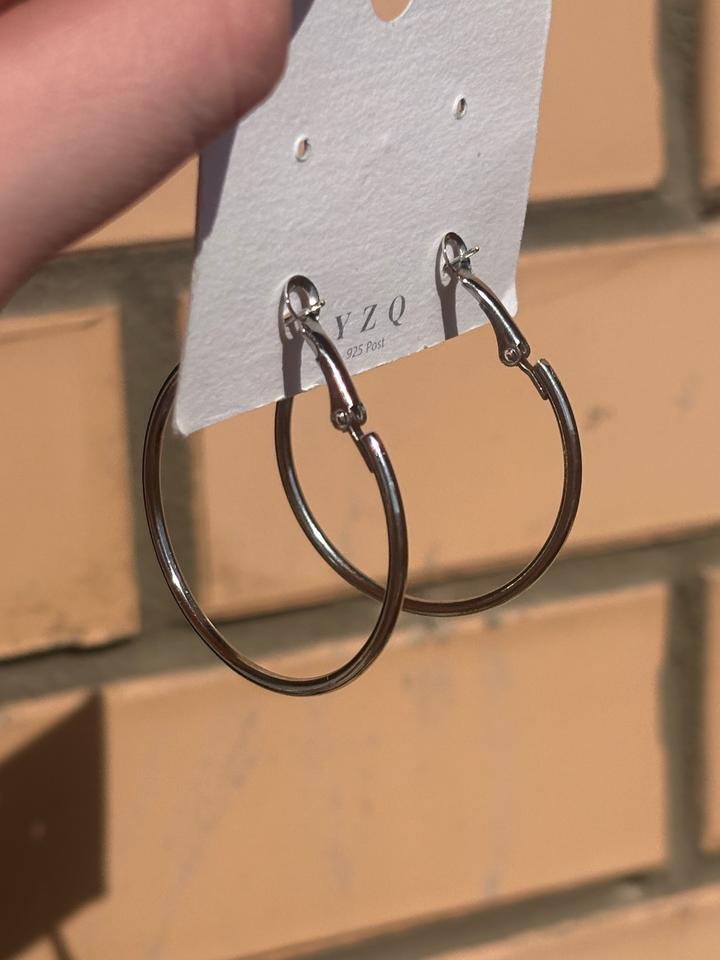 Серьги-кольца среднего размера из серебра 925 пробы