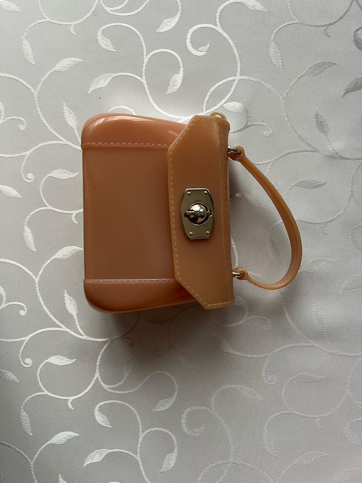 Резиновая сумочка