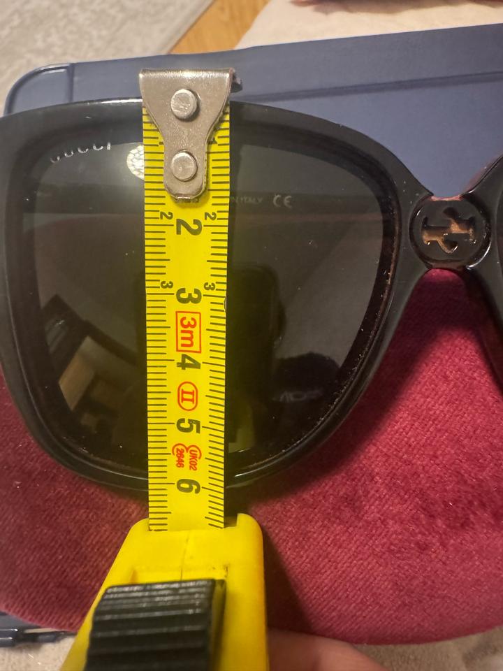 Солнцезащитные очки Gucci