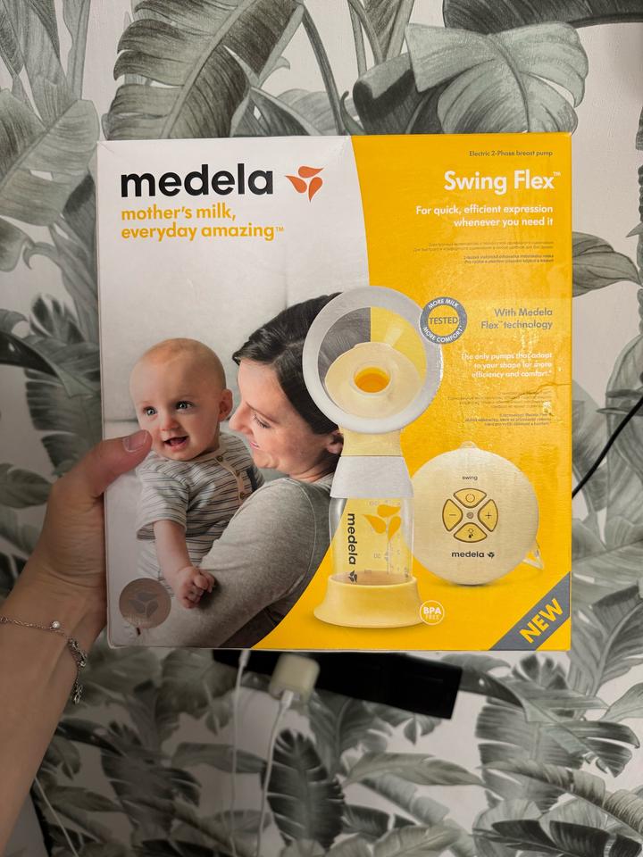 Молокоотсос Medela электронный
