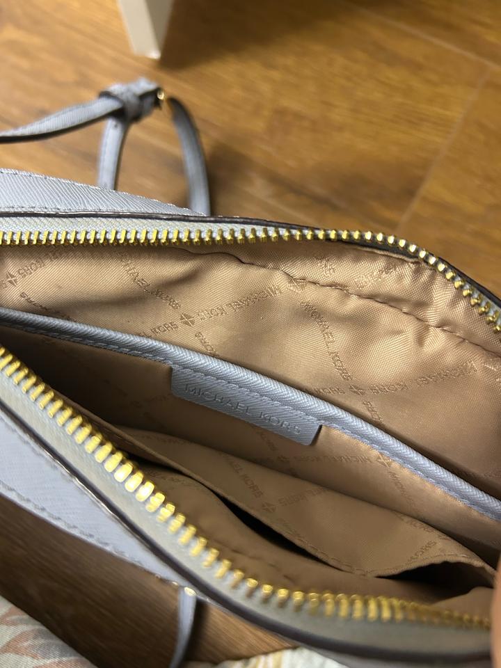 Голубая сумка от Michael Kors