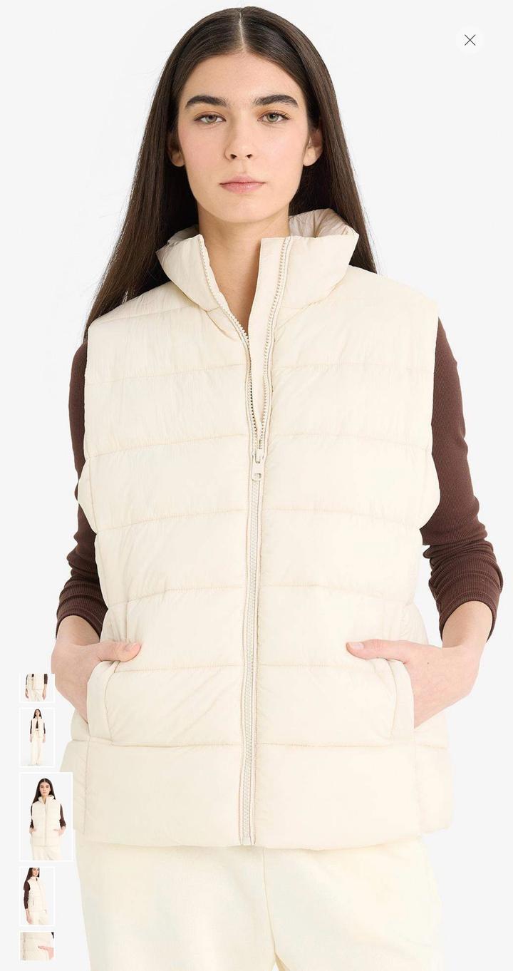 Жилетка безрукавка