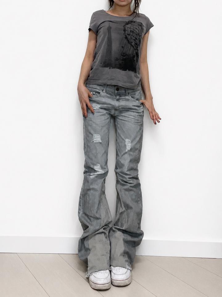 Custom distressed snake skin flared jeans
