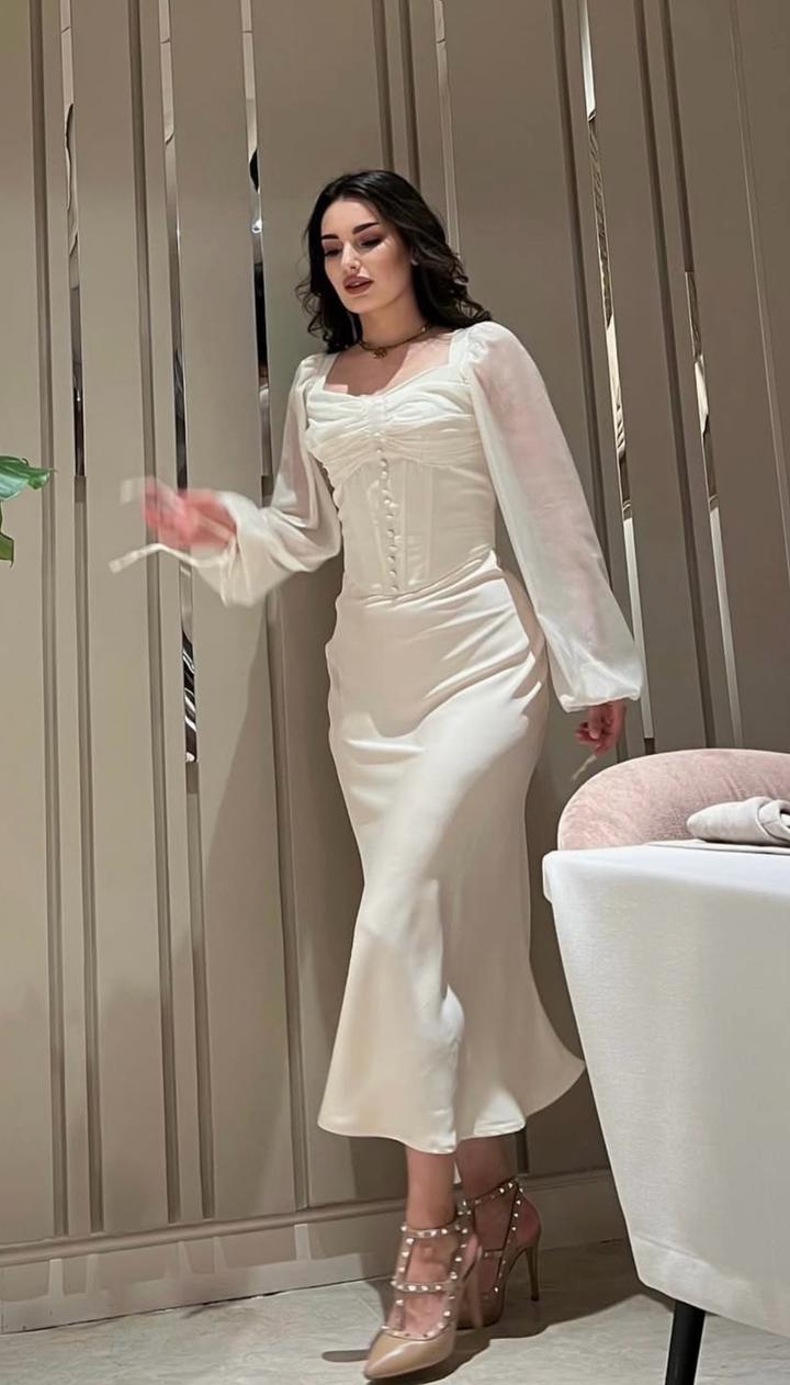 Эффектный корсетный топ и трендовая юбка