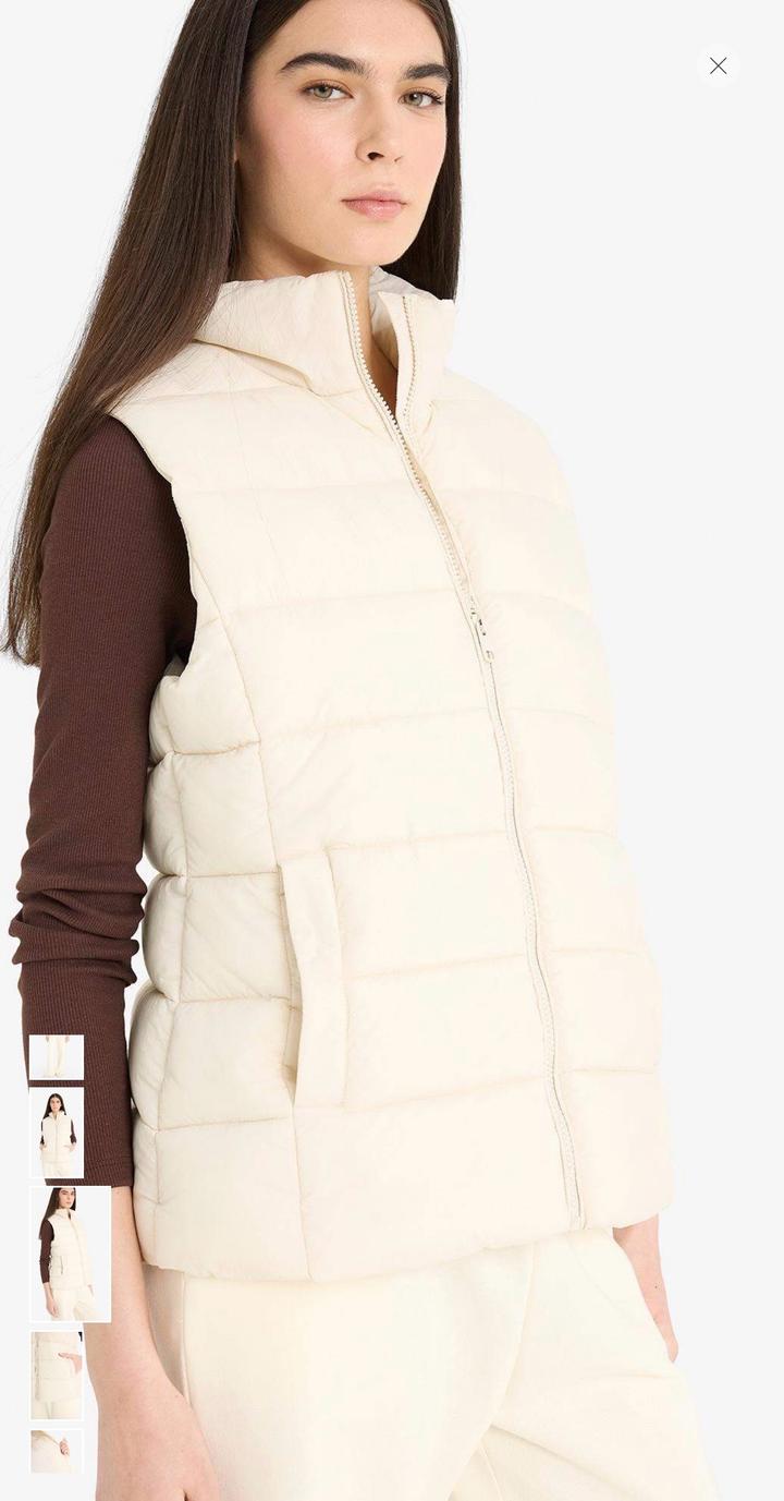 Жилетка безрукавка