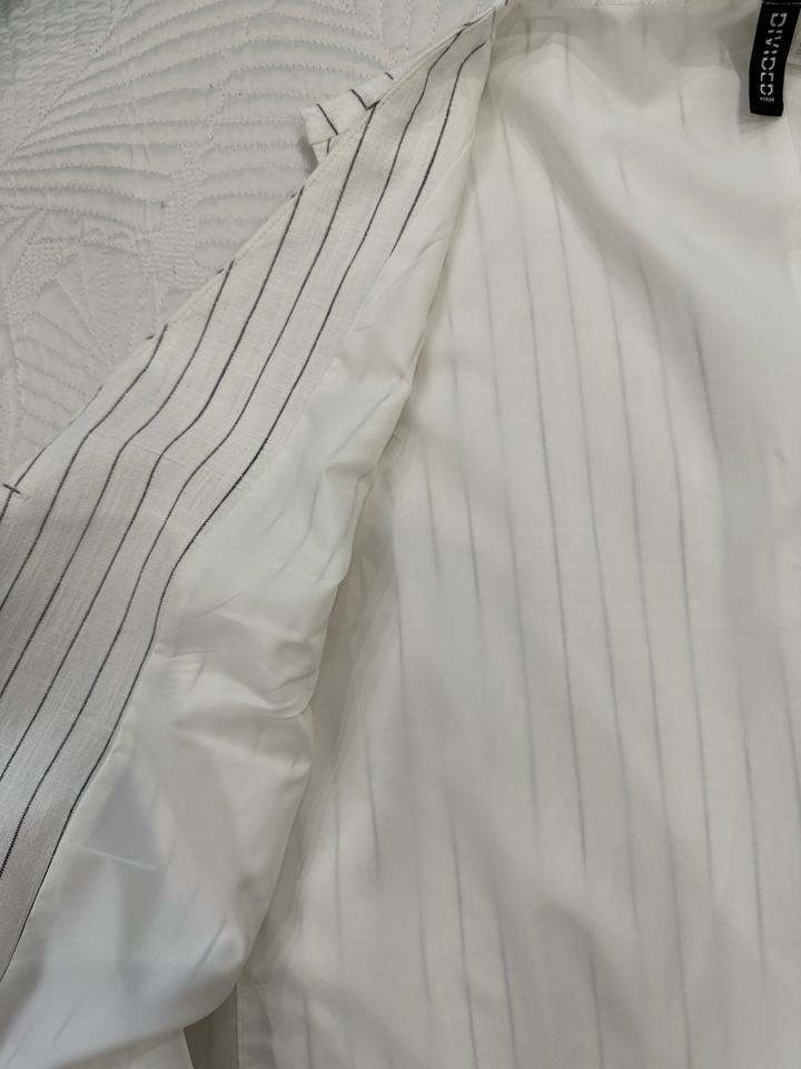 Продам льняную жилетку H&M