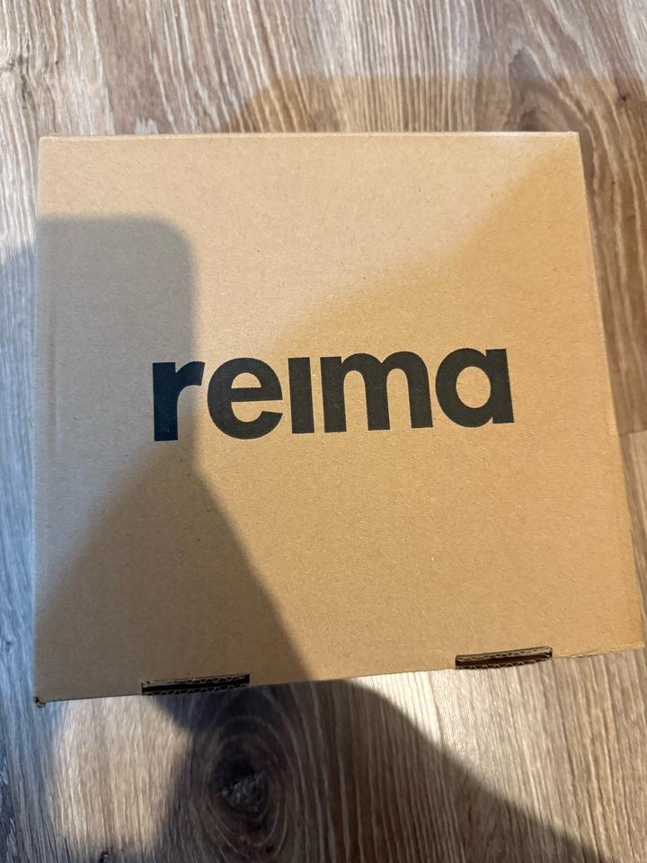 зимние сапоги Reima