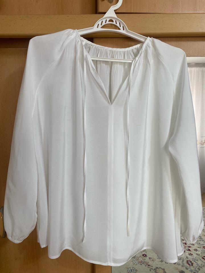 Белая блузка