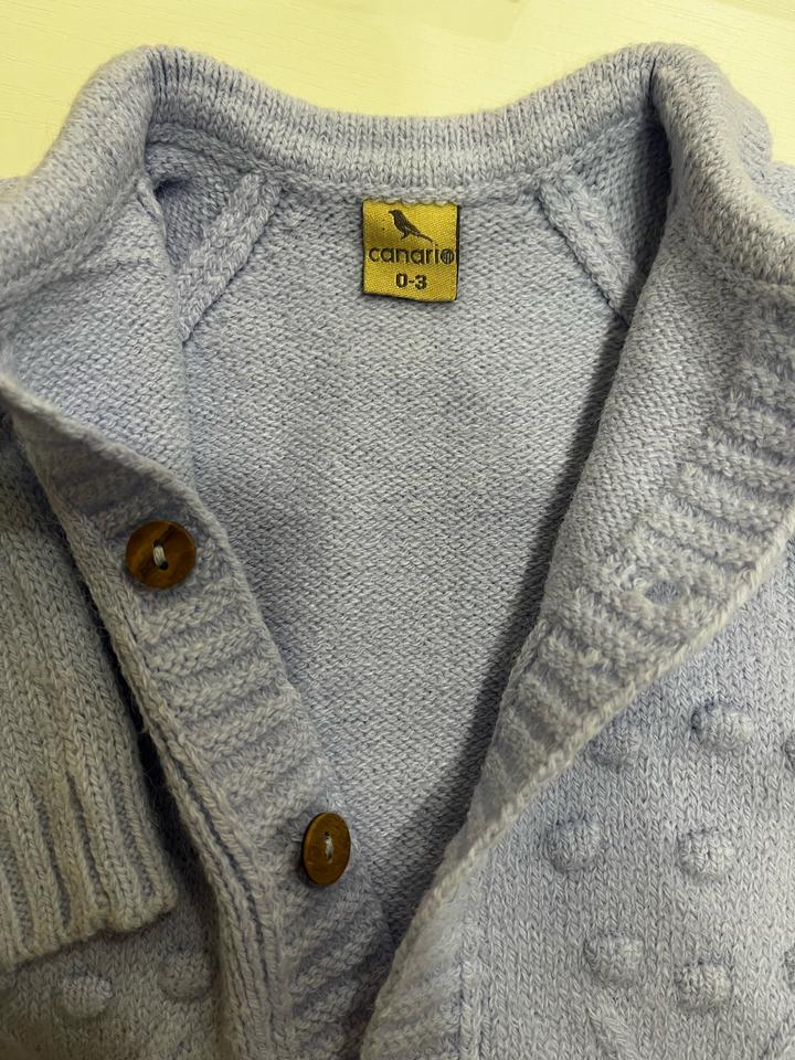 Комбинезон вязаный для новорожденного