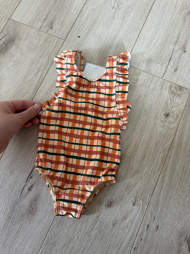 Купальник на девочку 6 мес новый