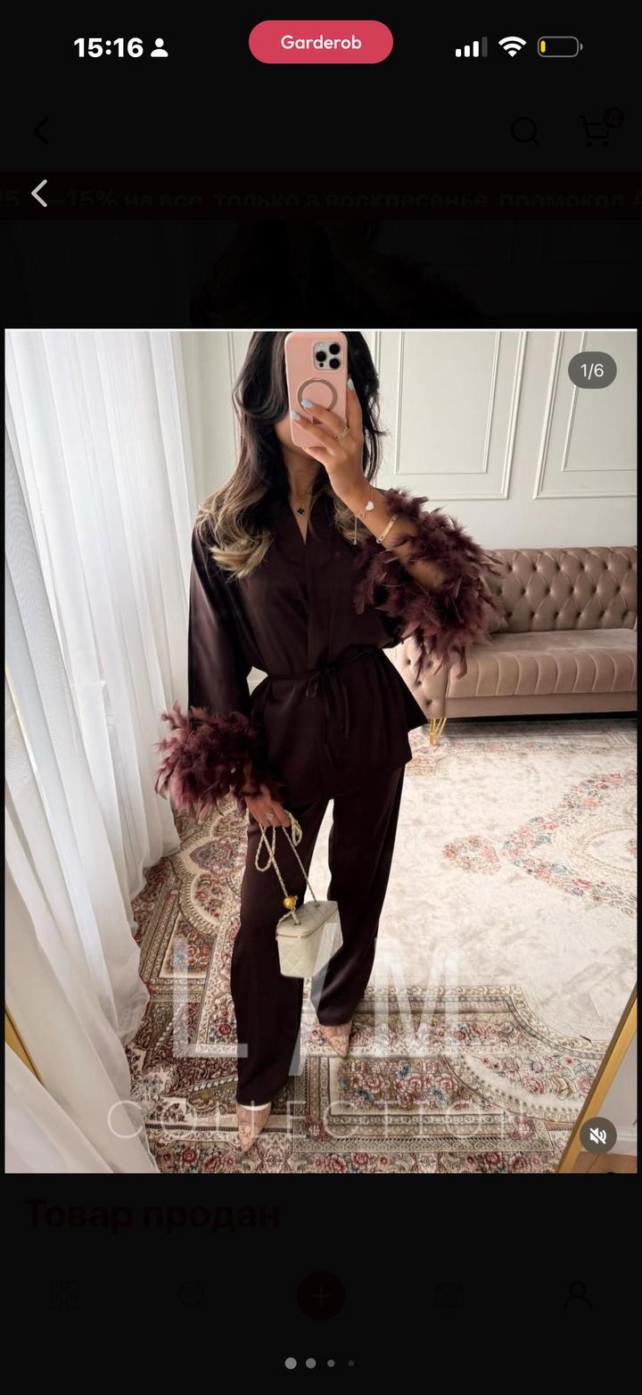 Продам красивый атласовый костюм, цвет красивый, шоколадный. На рукавах перья