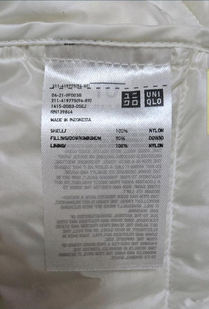 Белая жилетка Uniqlo