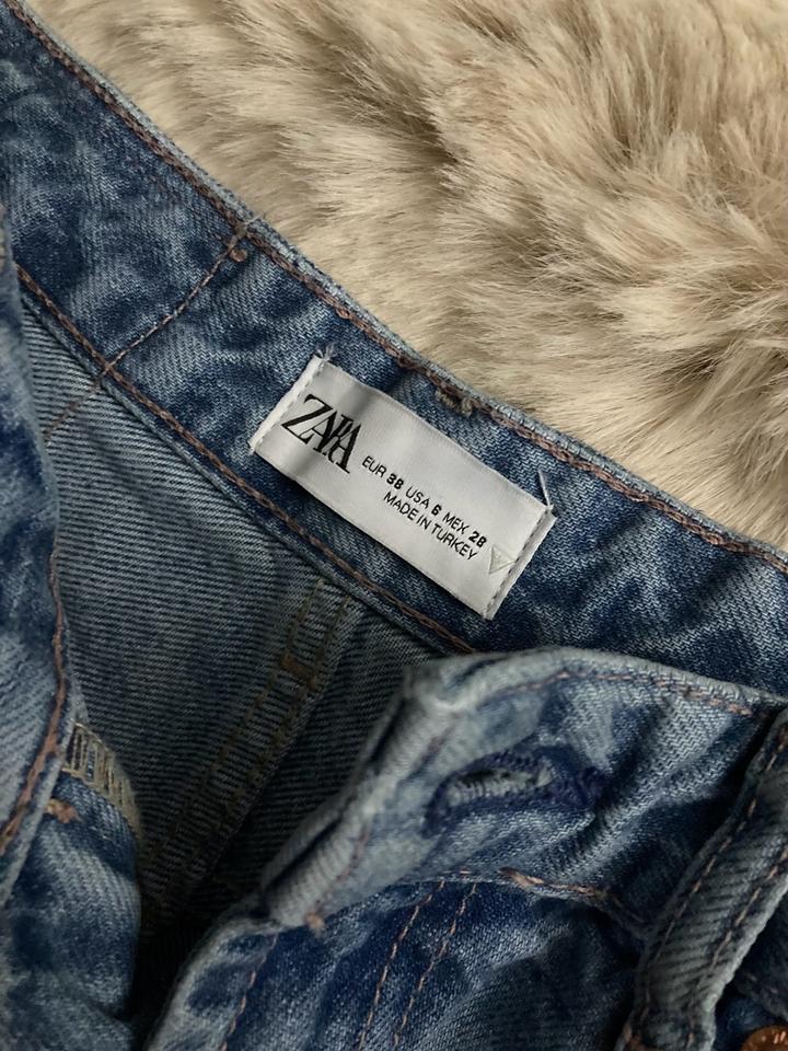 Голубые джинсы 28