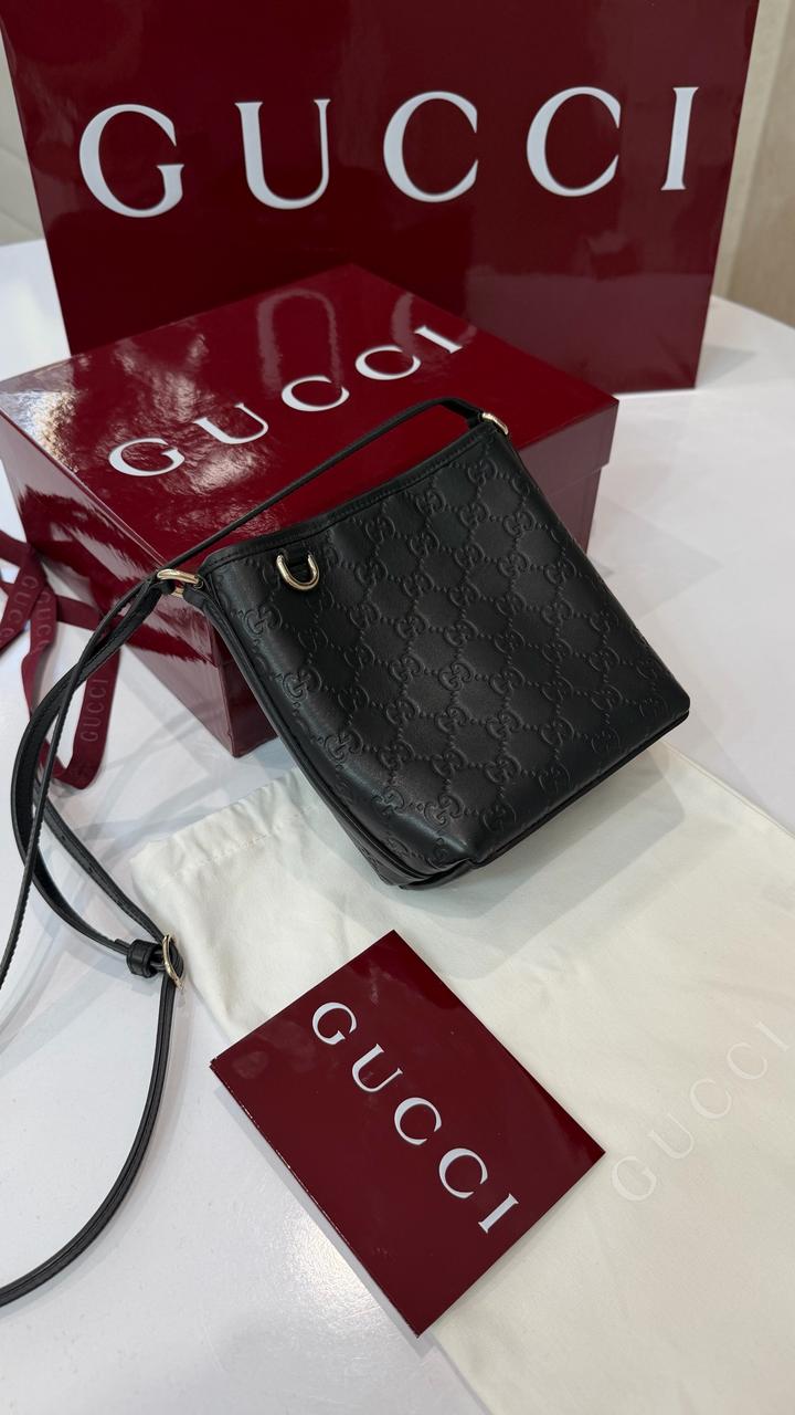 Сумка Gucci GG Emblem nano bucket bag