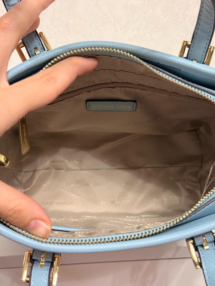 Голубая сумка Michael Kors