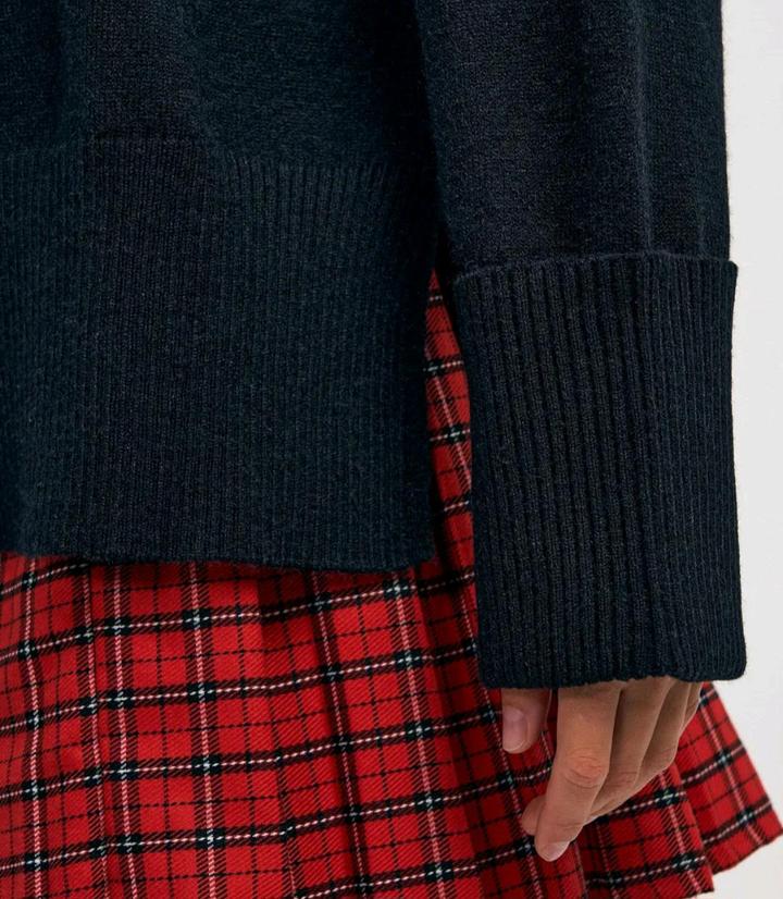 Удлиненный вязаный свитер