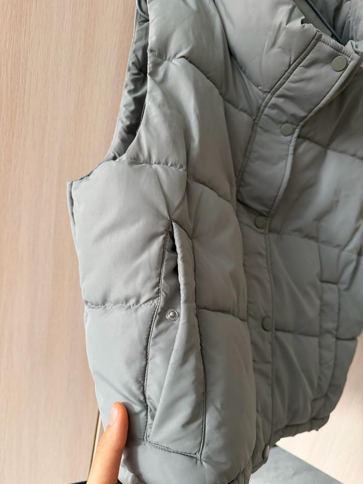 Безрукавка новая