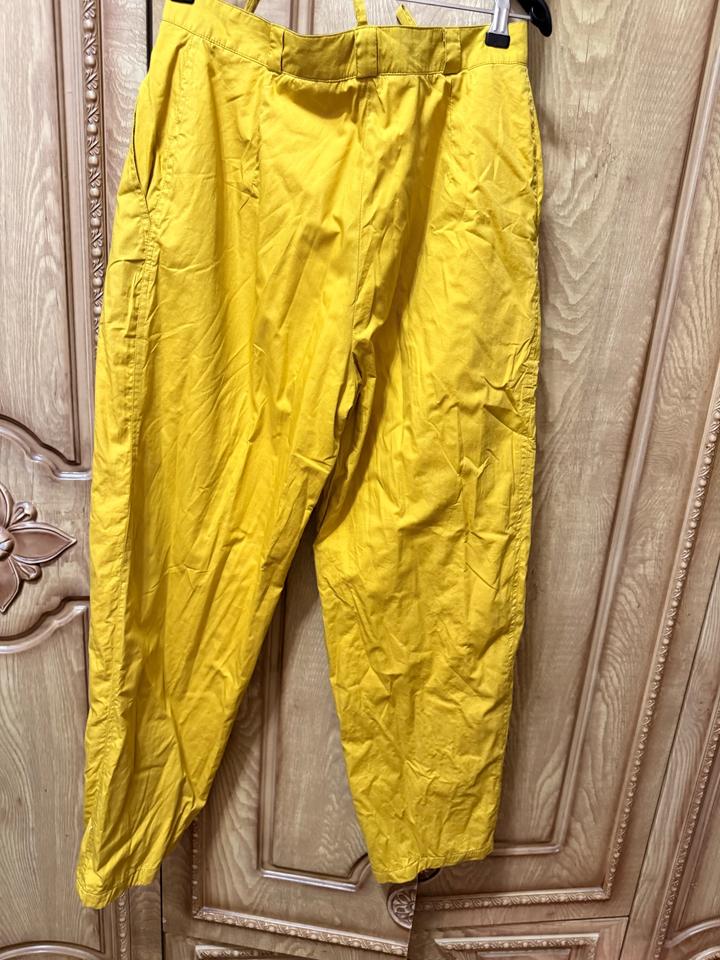 Утеплённые горчичные брюки oversized с необычным кроем S/M