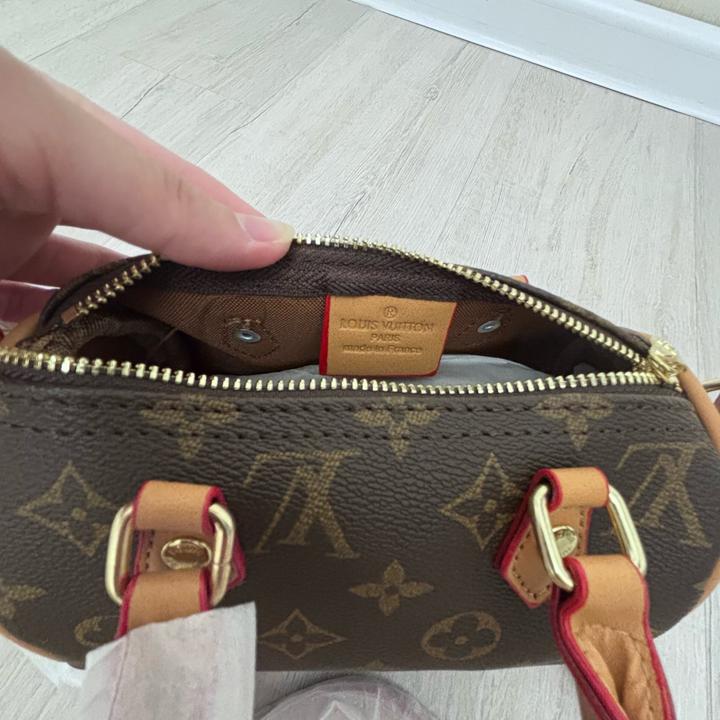 Маленькая коричневая сумка-бочонок Louis Vuitton