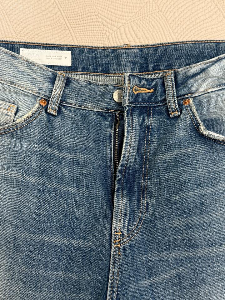 Рваные джинсы Zara