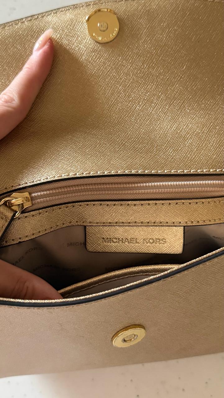 Золотистая сумка Michael Kors