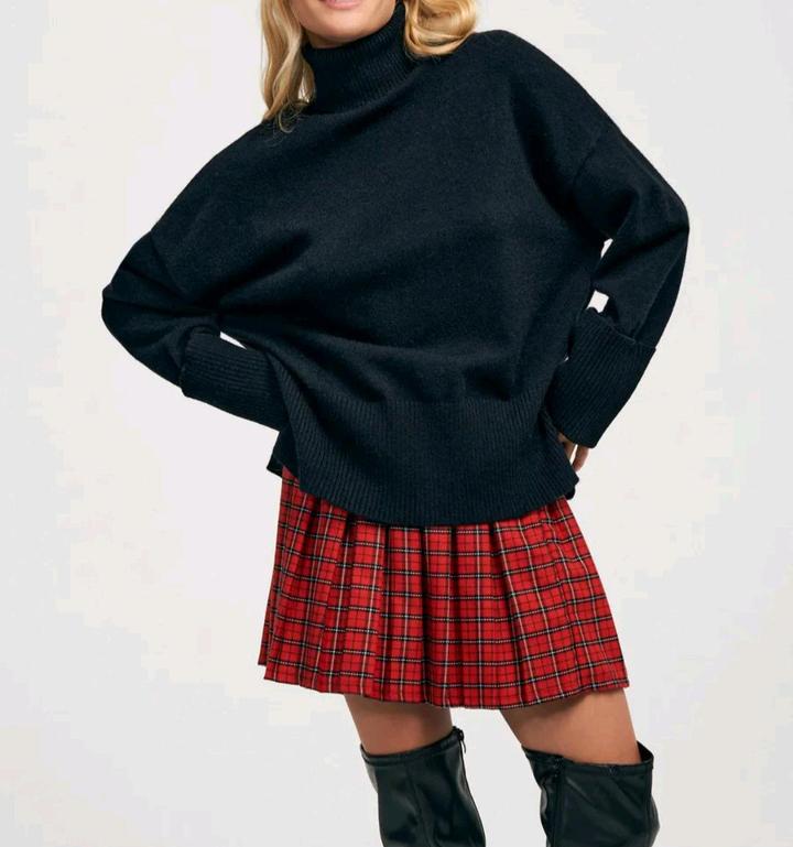 Удлиненный вязаный свитер