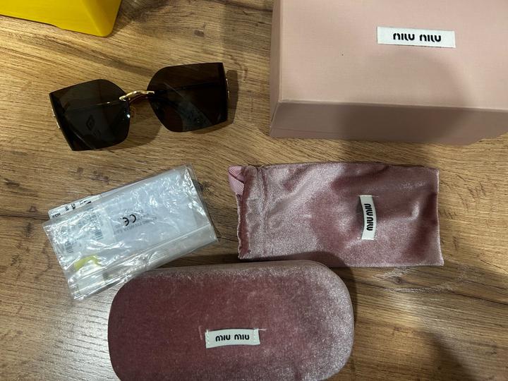 Очки miumiu