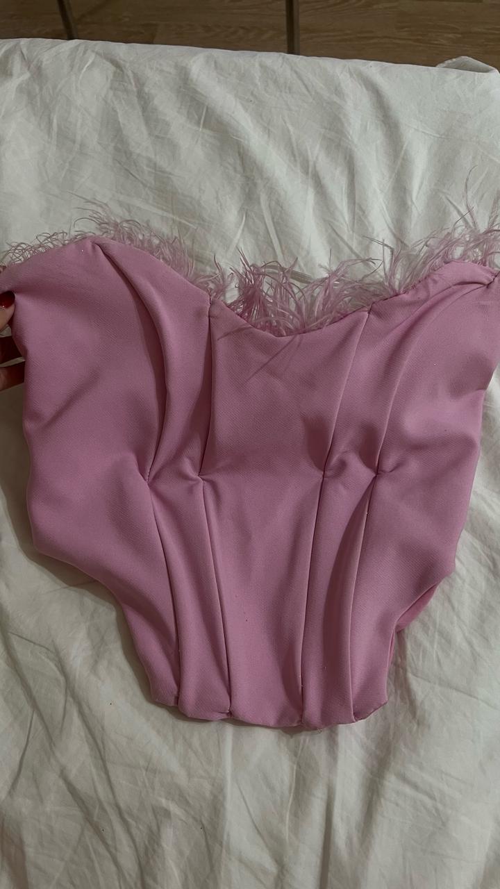 Новый корсет розовый с перьями