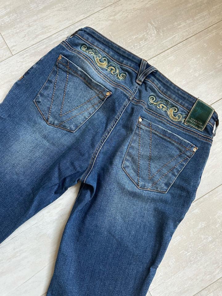 Джинсы Versace