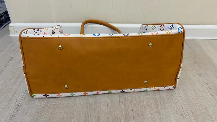 Дорожная сумка от Louis Vuitton