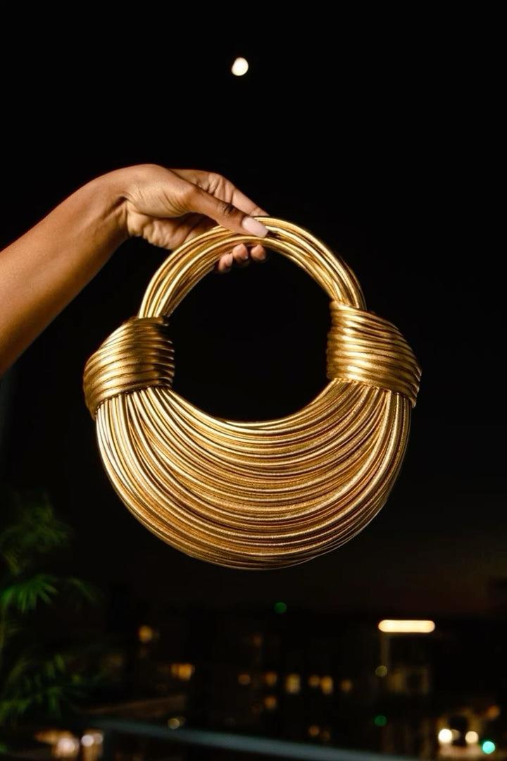 Золотистая сумка