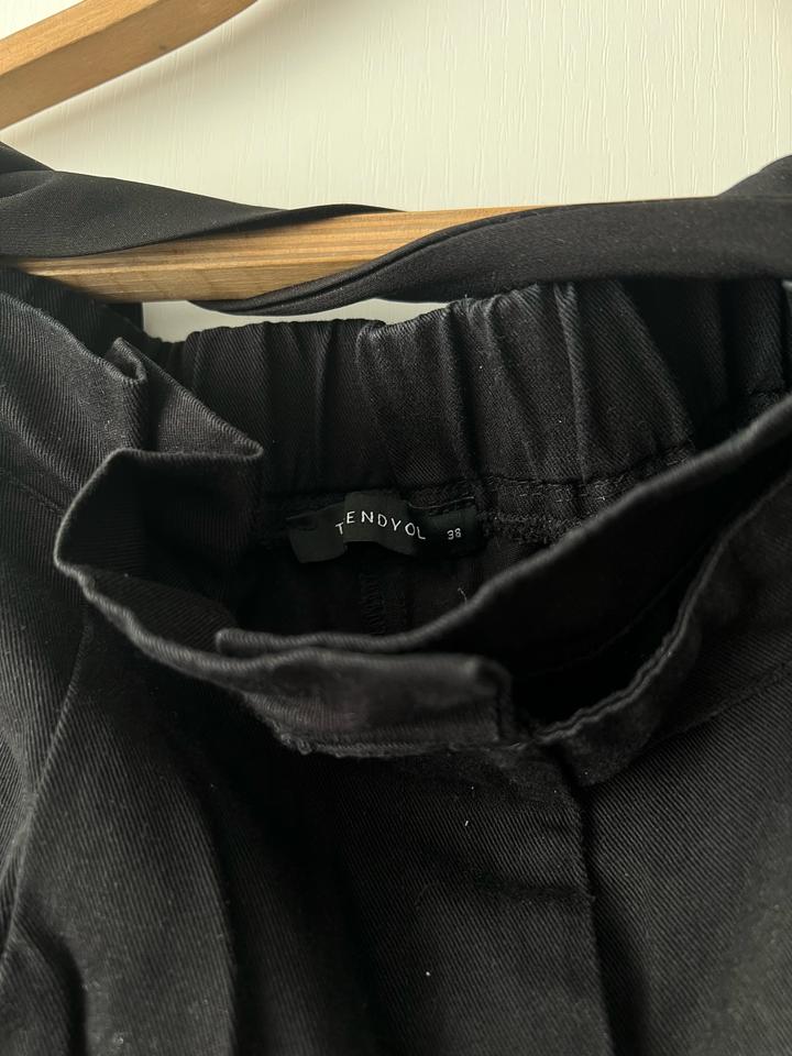 Черные брюки