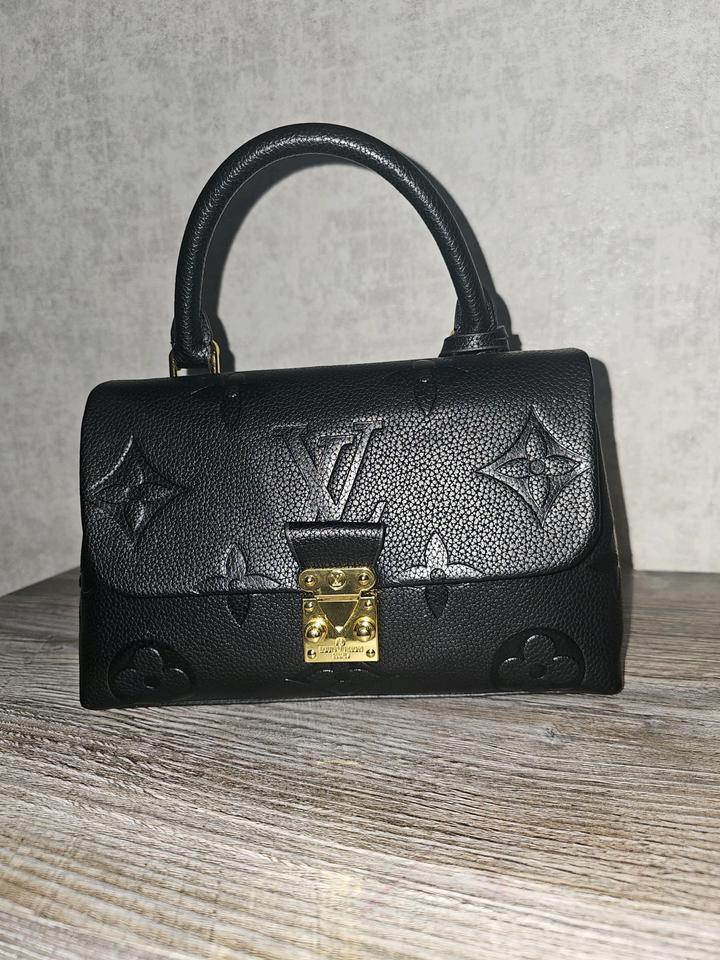 Кожаная сумка Louis Vuitton
