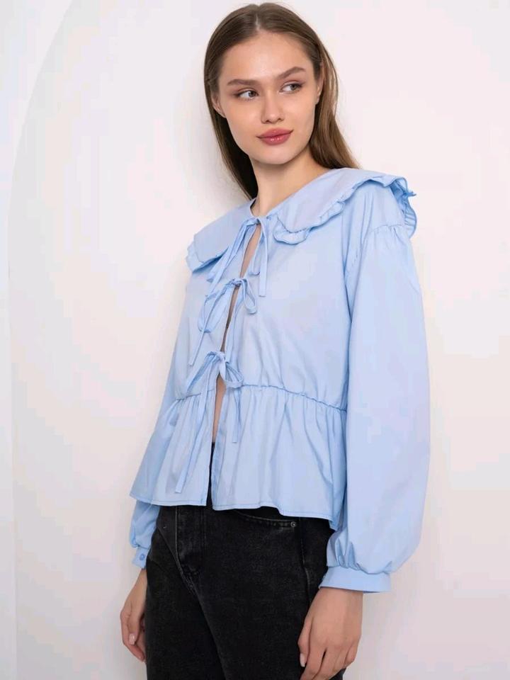 Блузка с бантиками