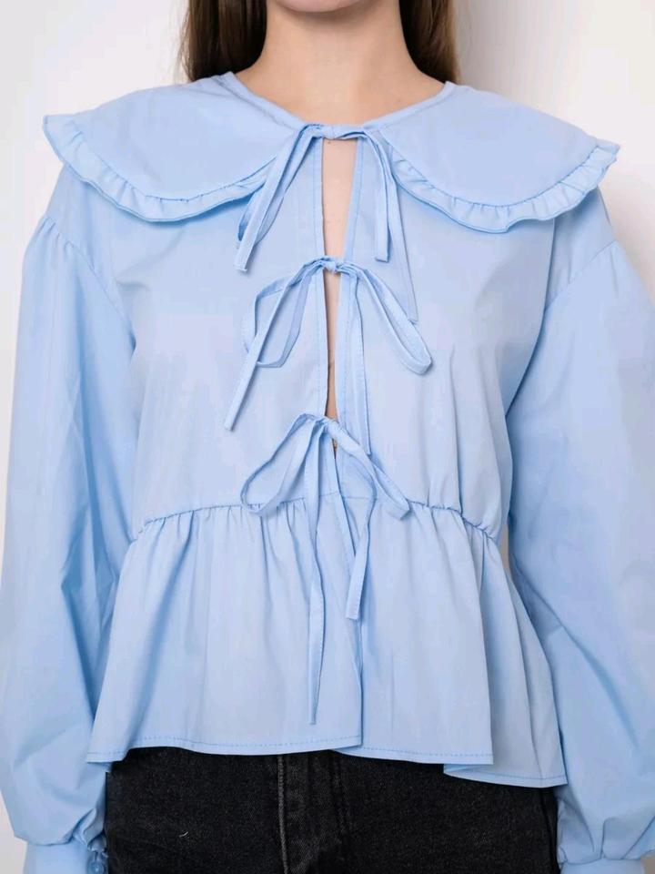 Блузка с бантиками