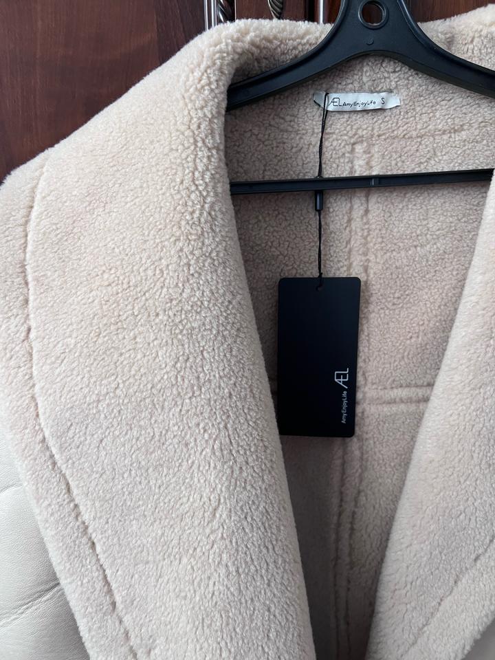 Дубленка новая