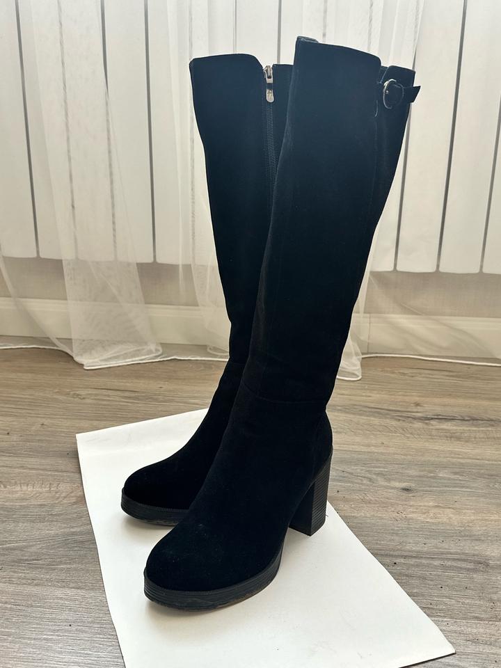 Зимние сапоги на каблуках