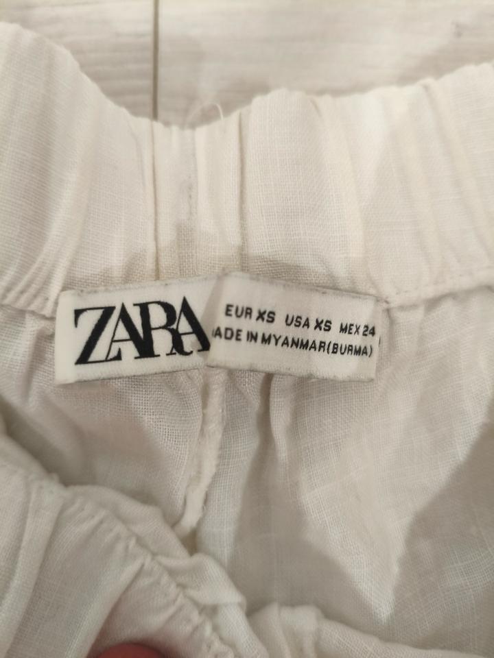 Белые льняные штаны Зара