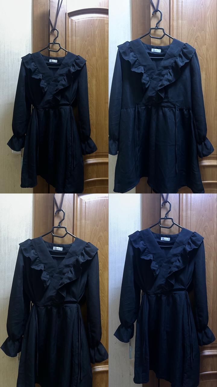 Чёрное платье с рюшами.