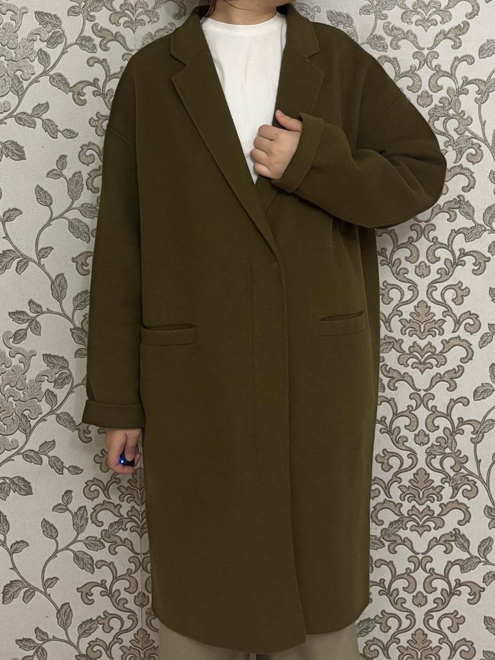 Темно зеленое пальто