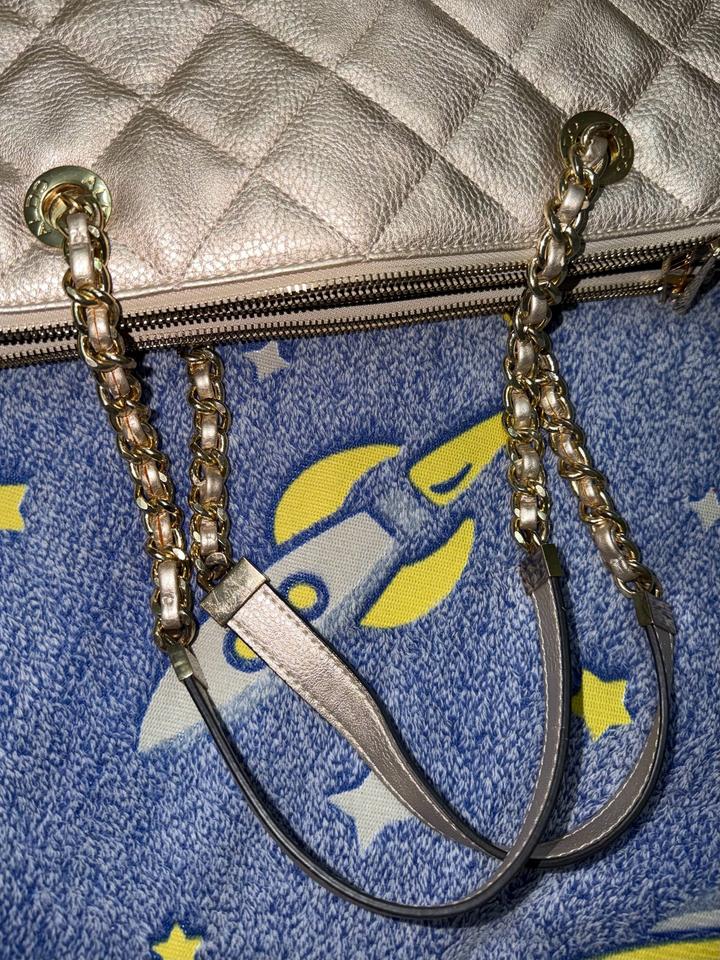 Золотистая сумка Aldo