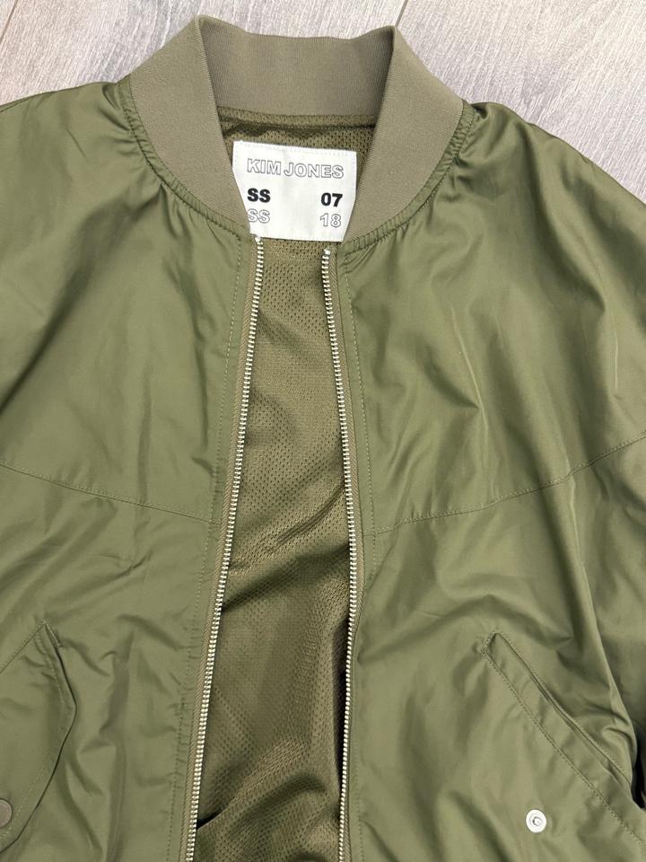 KIM JONES x GU ветровка