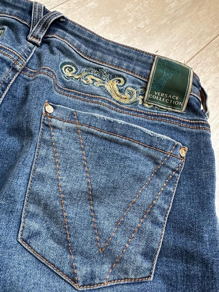 Джинсы Versace