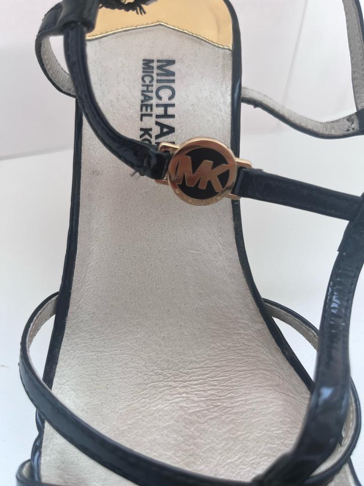 Сандалии на танкетке Michael Kors