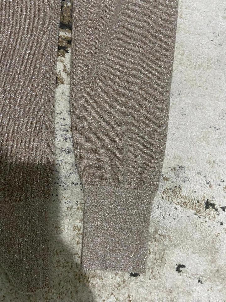 Стильный трикотажный костюм с люрексом